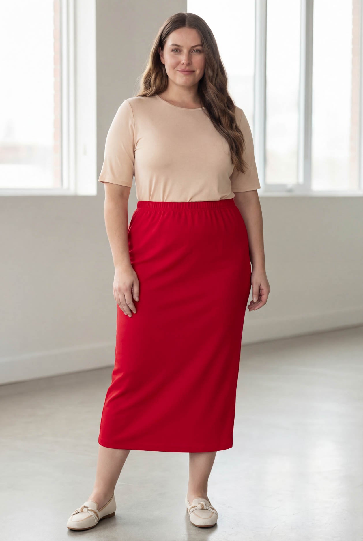 Model wearing Nuggles® 34" Classic Skirt in Red