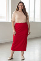 Model wearing Nuggles® 34" Classic Skirt in Red