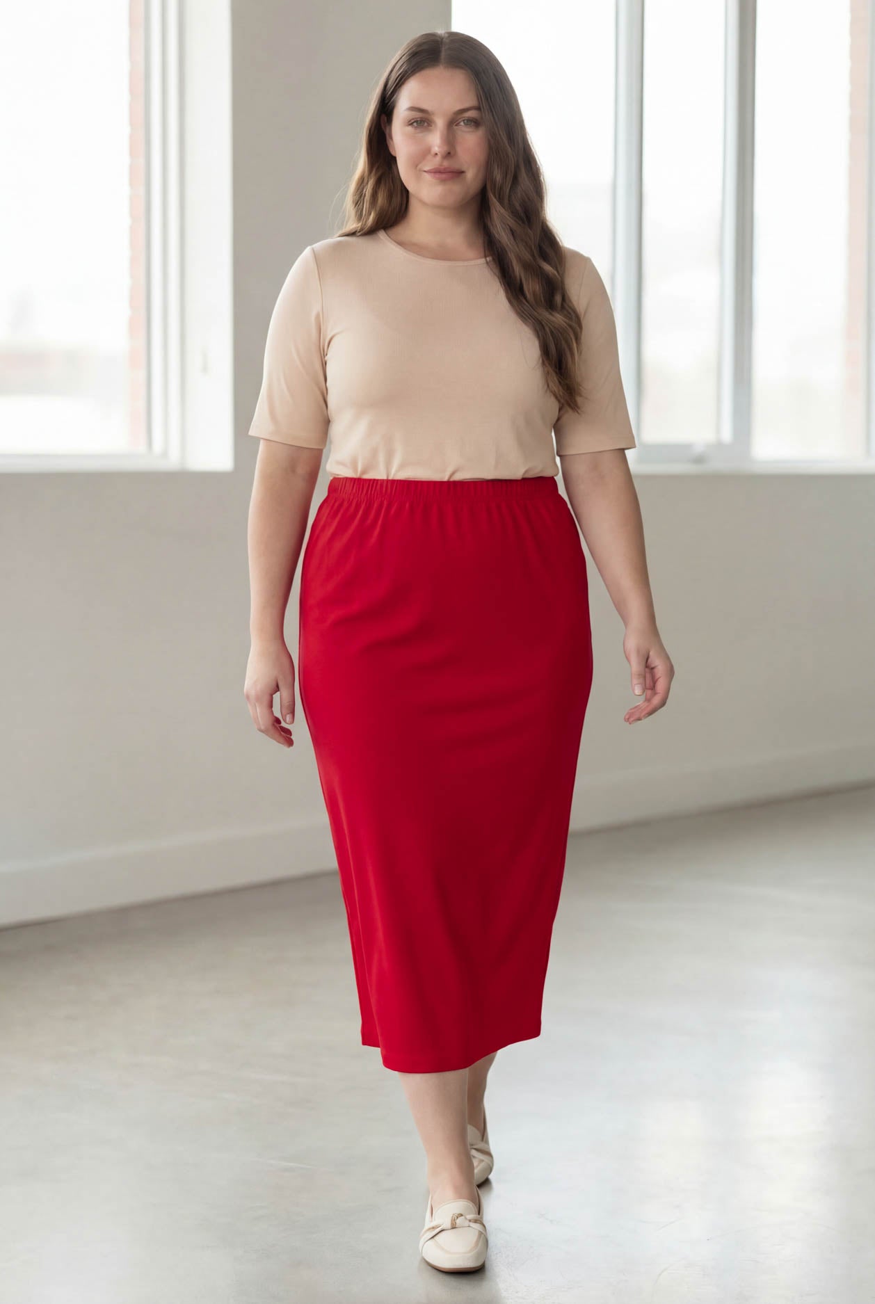 Model wearing Nuggles® 34" Classic Skirt in Red