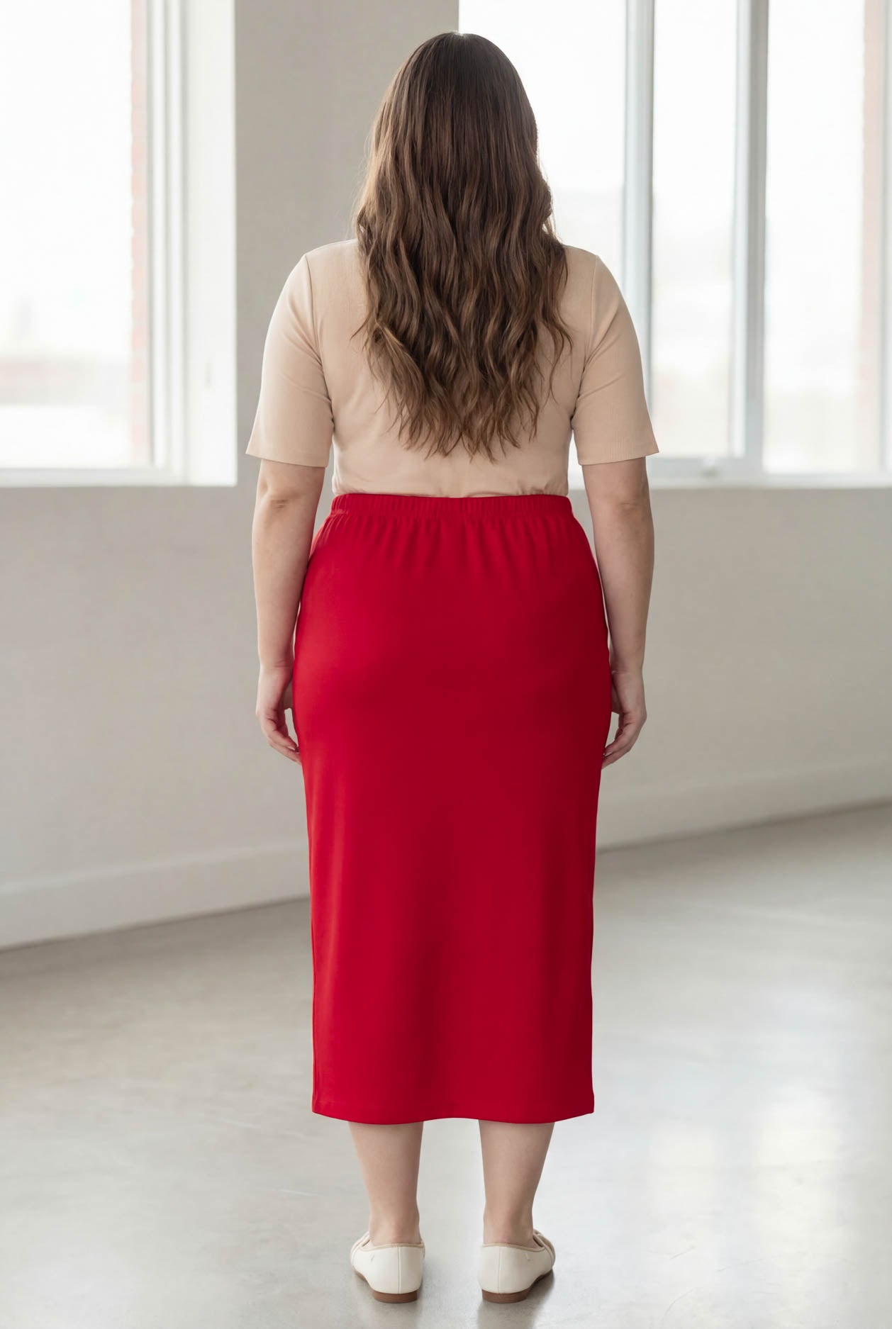 Model wearing Nuggles® 34" Classic Skirt in Red