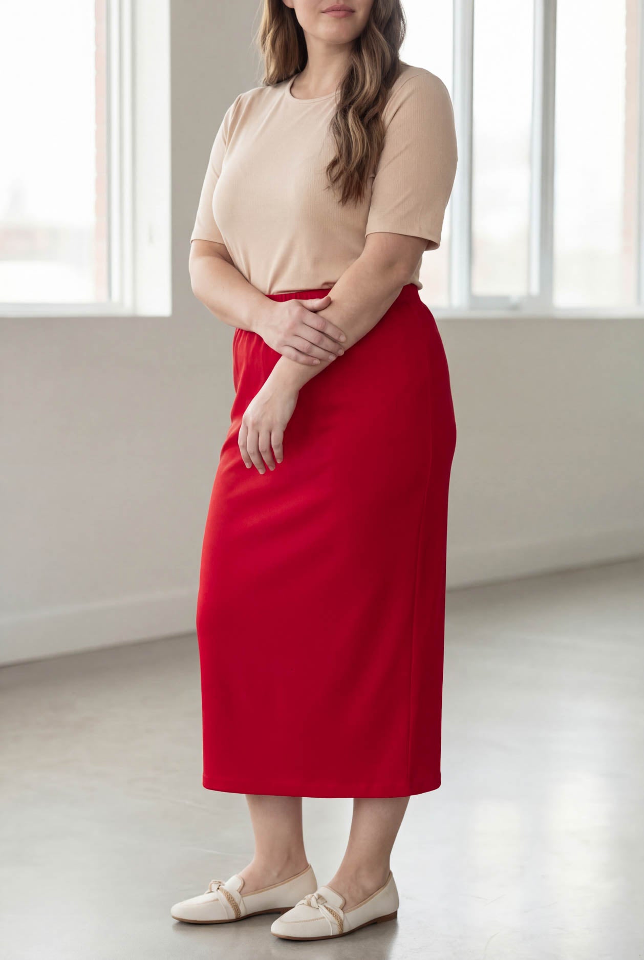 Model wearing Nuggles® 34" Classic Skirt in Red