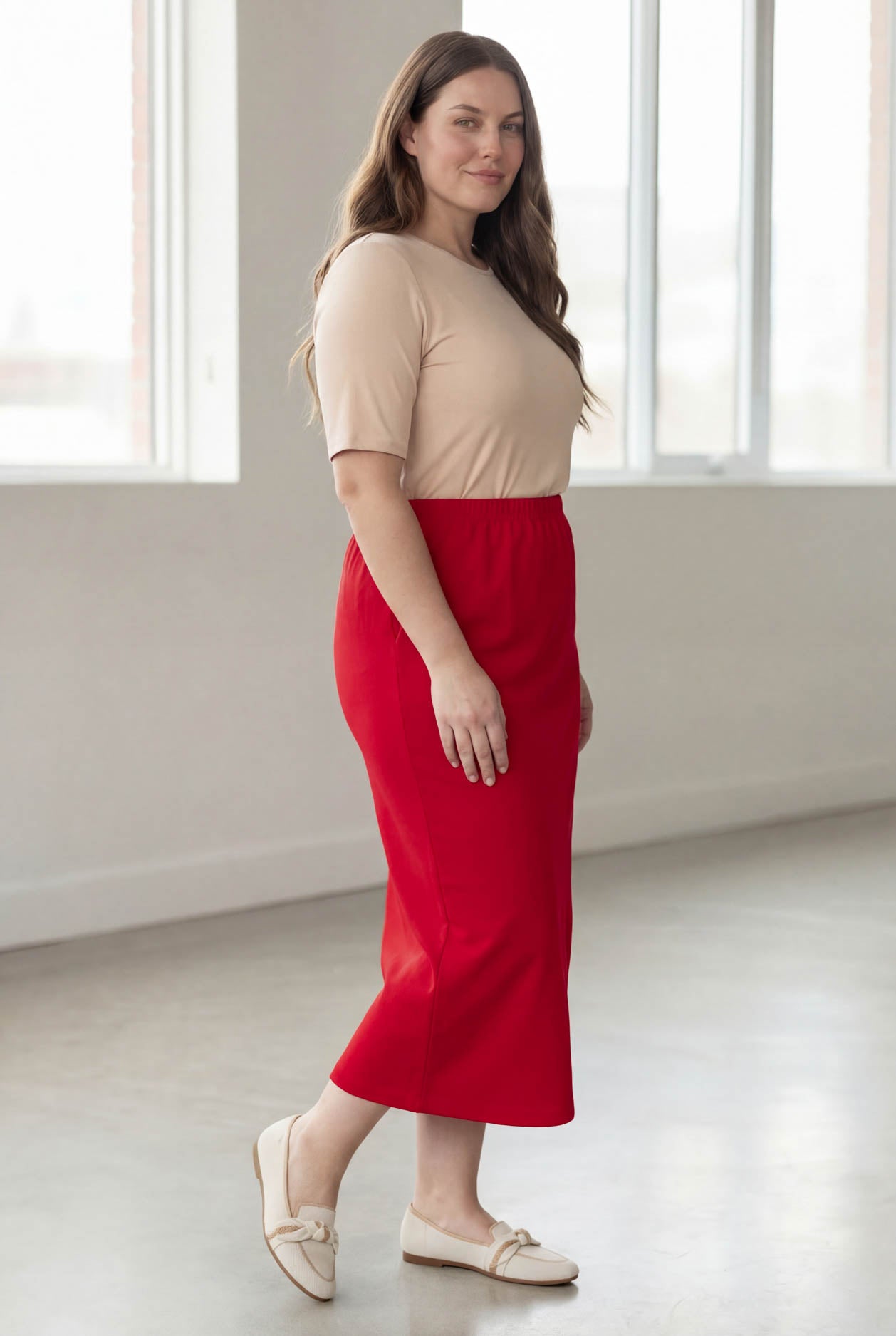 Model wearing Nuggles® 34" Classic Skirt in Red