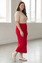 Model wearing Nuggles® 34" Classic Skirt in Red