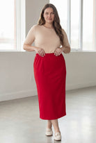Model wearing Nuggles® 34" Classic Skirt in Red