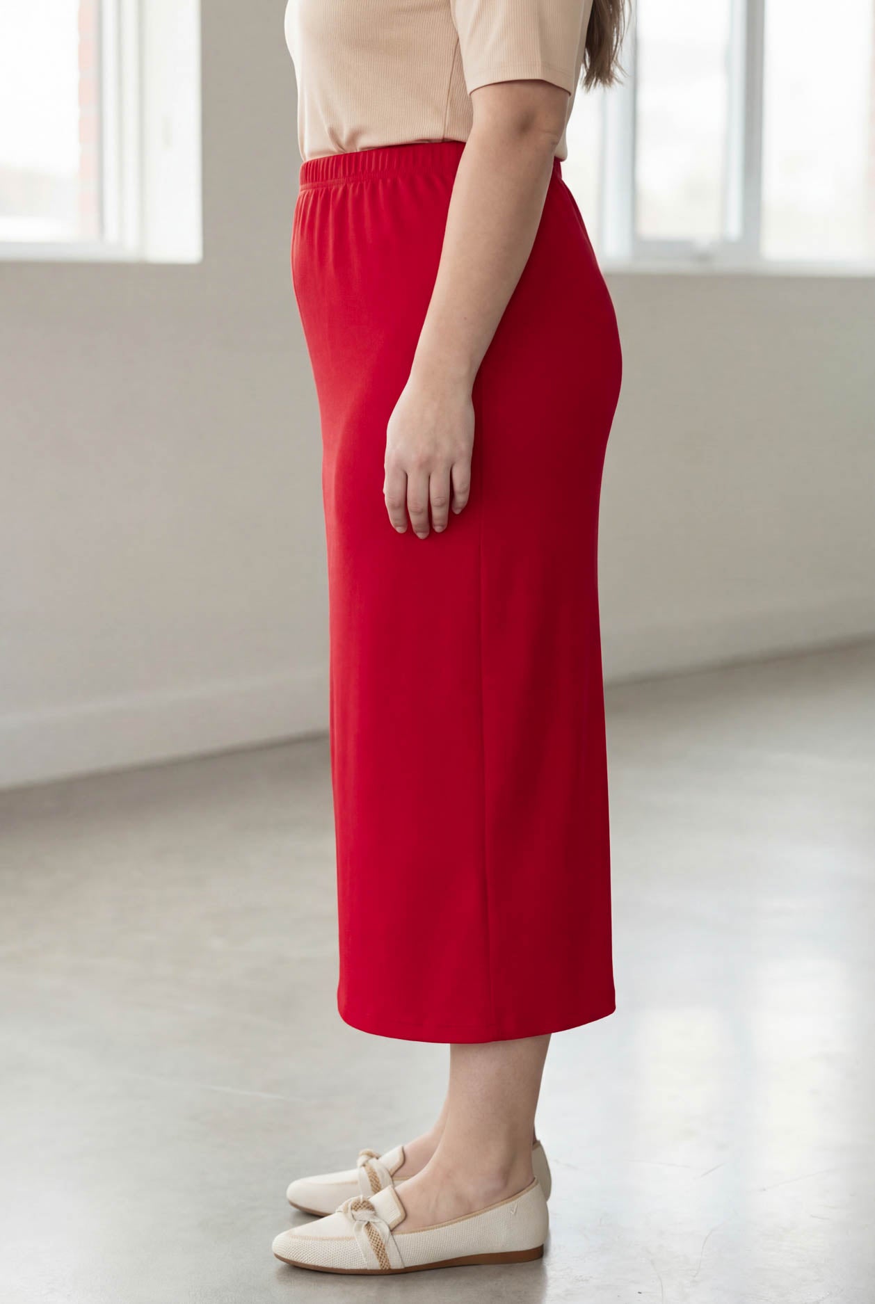 Model wearing Nuggles® 34" Classic Skirt in Red