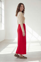 Model wearing Nuggles® 36" Classic Skirt in Red