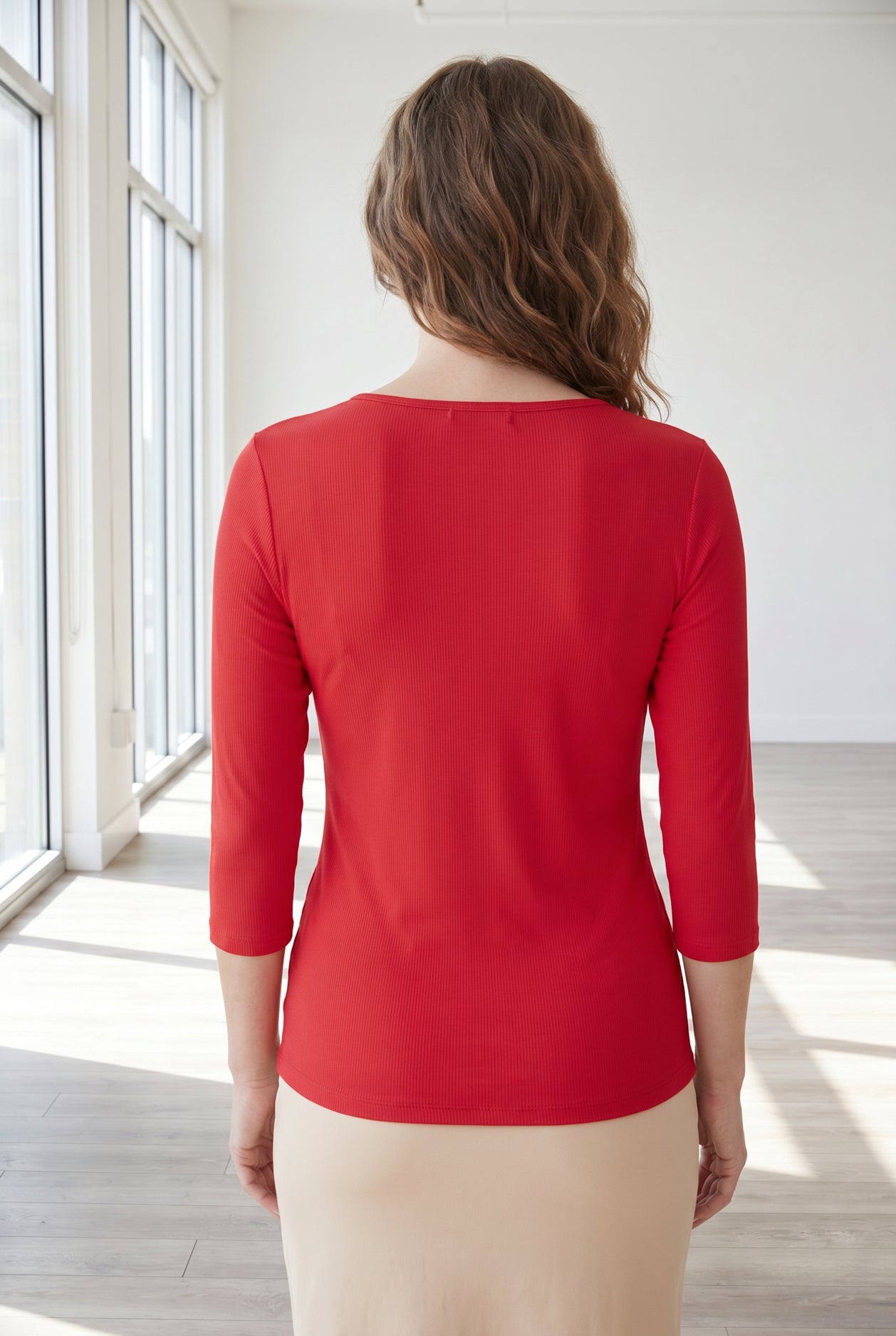Model wearing Nuggles® 3/4 Essential Ribbed Tee in Red