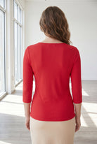 Model wearing Nuggles® 3/4 Essential Ribbed Tee in Red