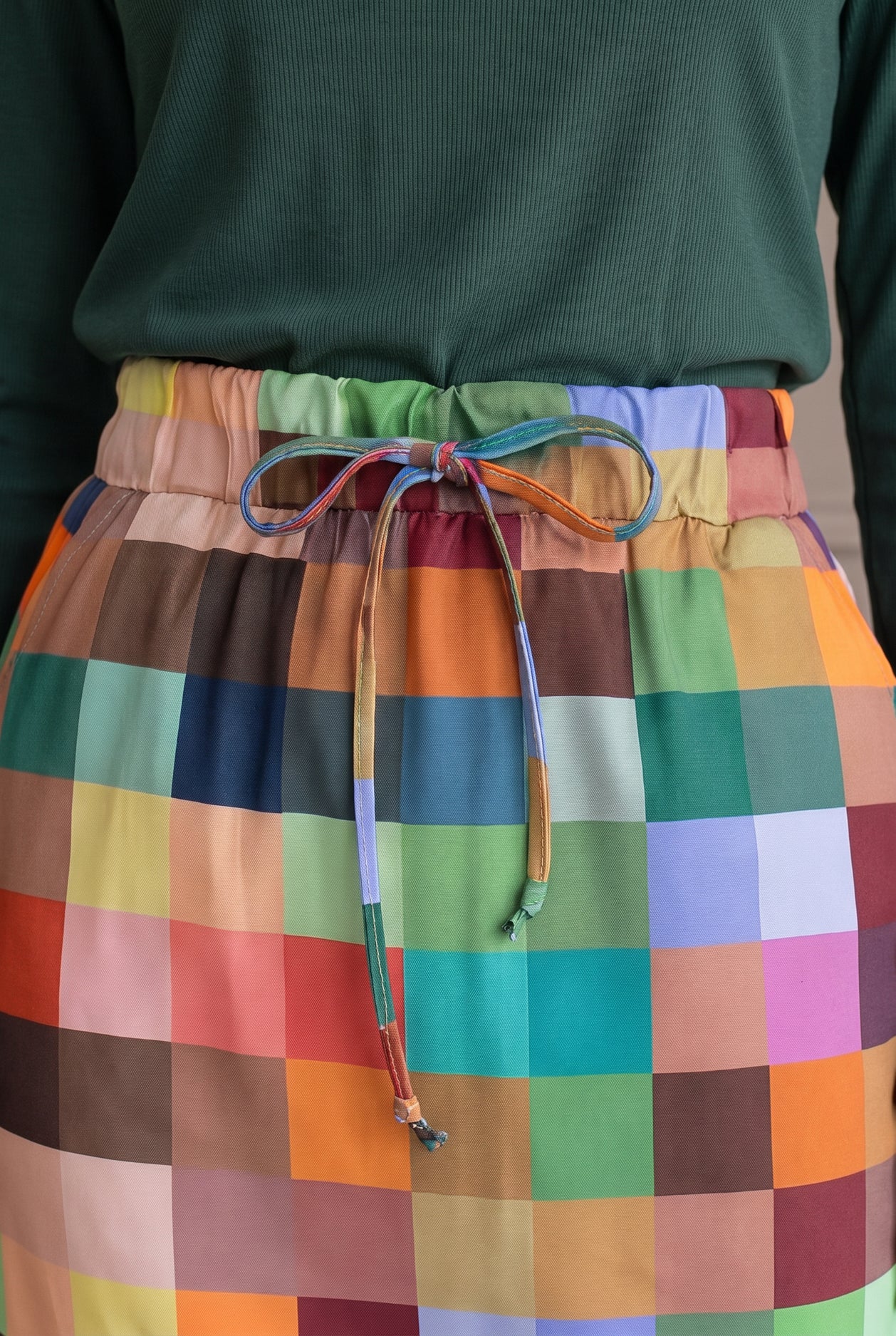 Model wearing Nuggles®  31" Drawstring Skirt in Retro Mosaic