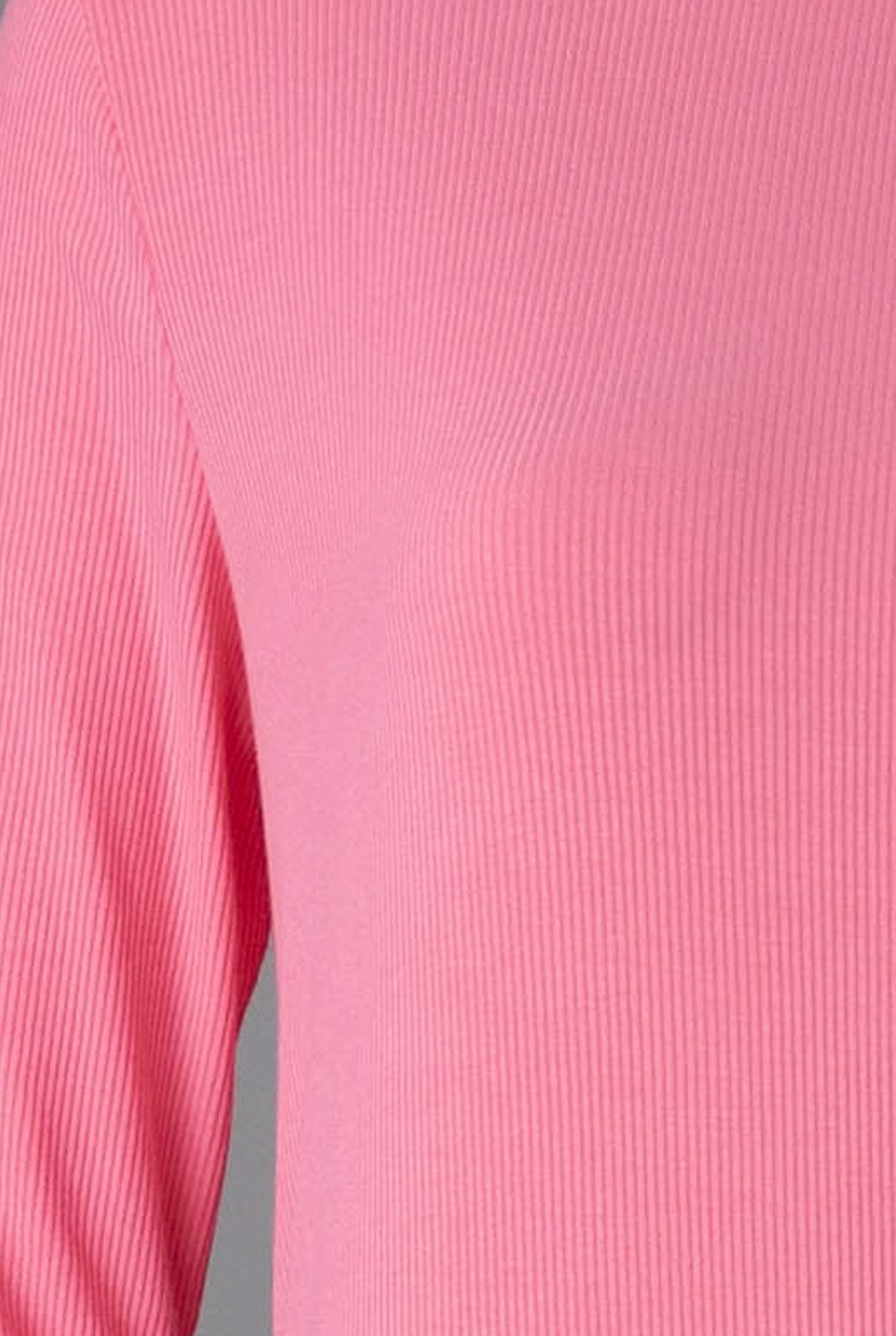 Model wearing Nuggles® Ribbed Midi Layering Dress in Pink