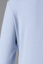 Model wearing Nuggles® Ribbed Midi Layering Dress in Soft Blue