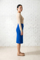 Model wearing Nuggles® 25" Relaxed Skirt in Royal Blue