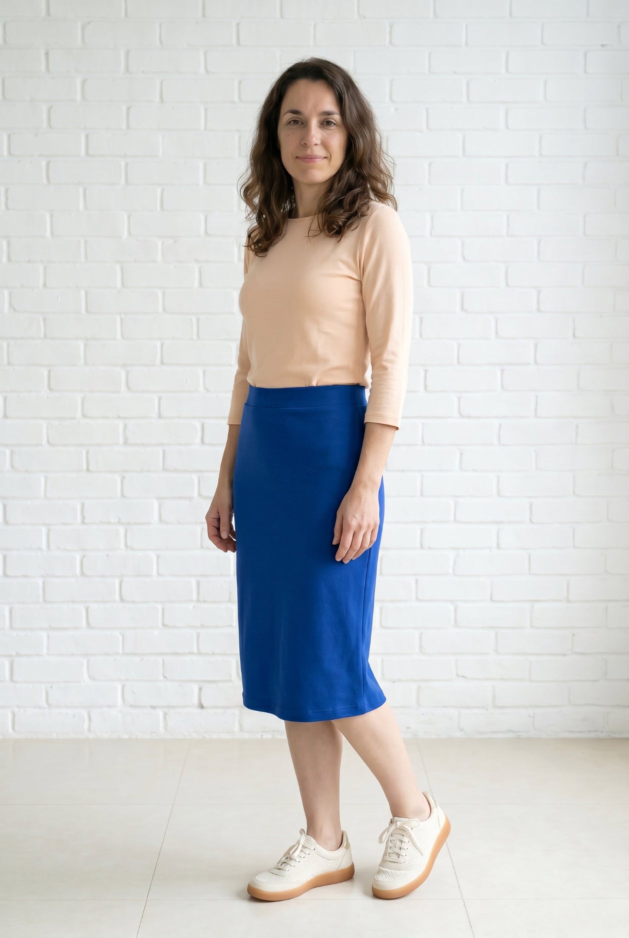 Model wearing Nuggles® 27" Relaxed Skirt in Royal Blue