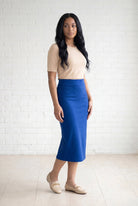 Model wearing Nuggles® 31" Relaxed Skirt in Royal Blue