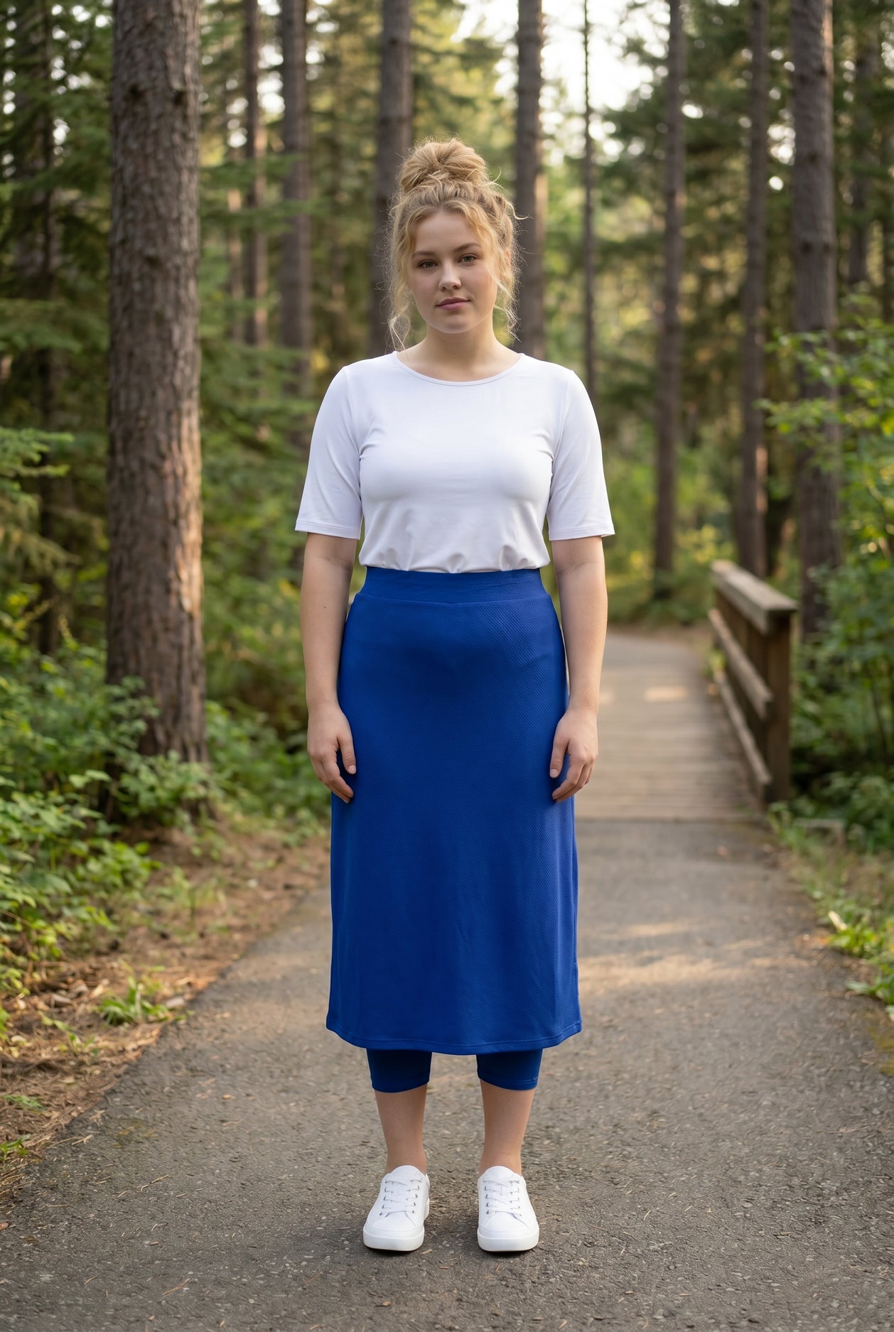 Model wearing Nuggles® 31" All-Sport Skirt in Royal Blue