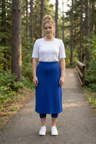 Model wearing Nuggles® 31" All-Sport Skirt in Royal Blue