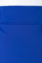 Model wearing Nuggles® 31" All-Sport Skirt in Royal Blue
