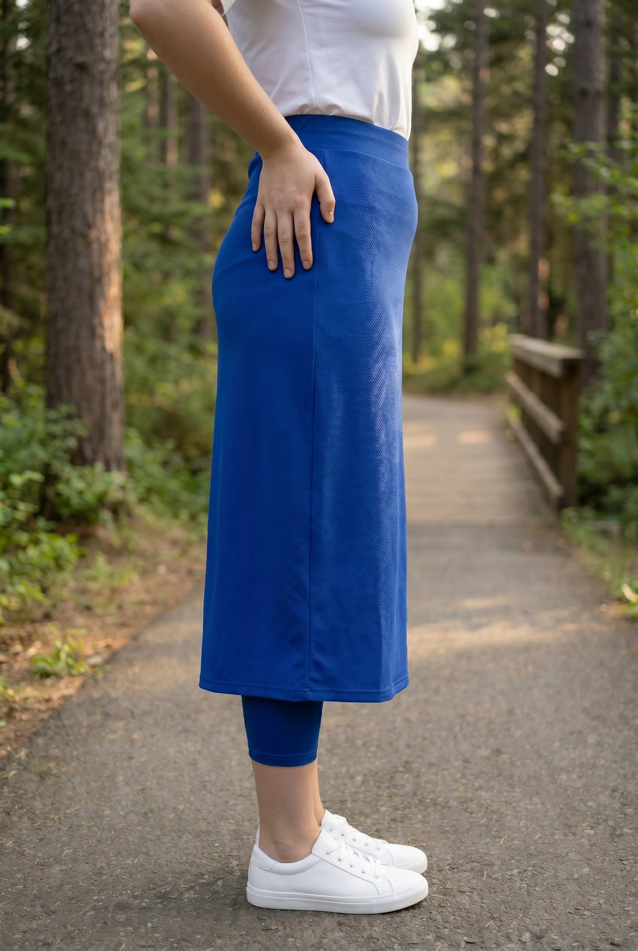 Model wearing Nuggles® 31" All-Sport Skirt in Royal Blue