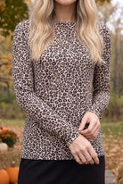 Model wearing Nuggles®  Long Sleeve Essential Tee in Safari