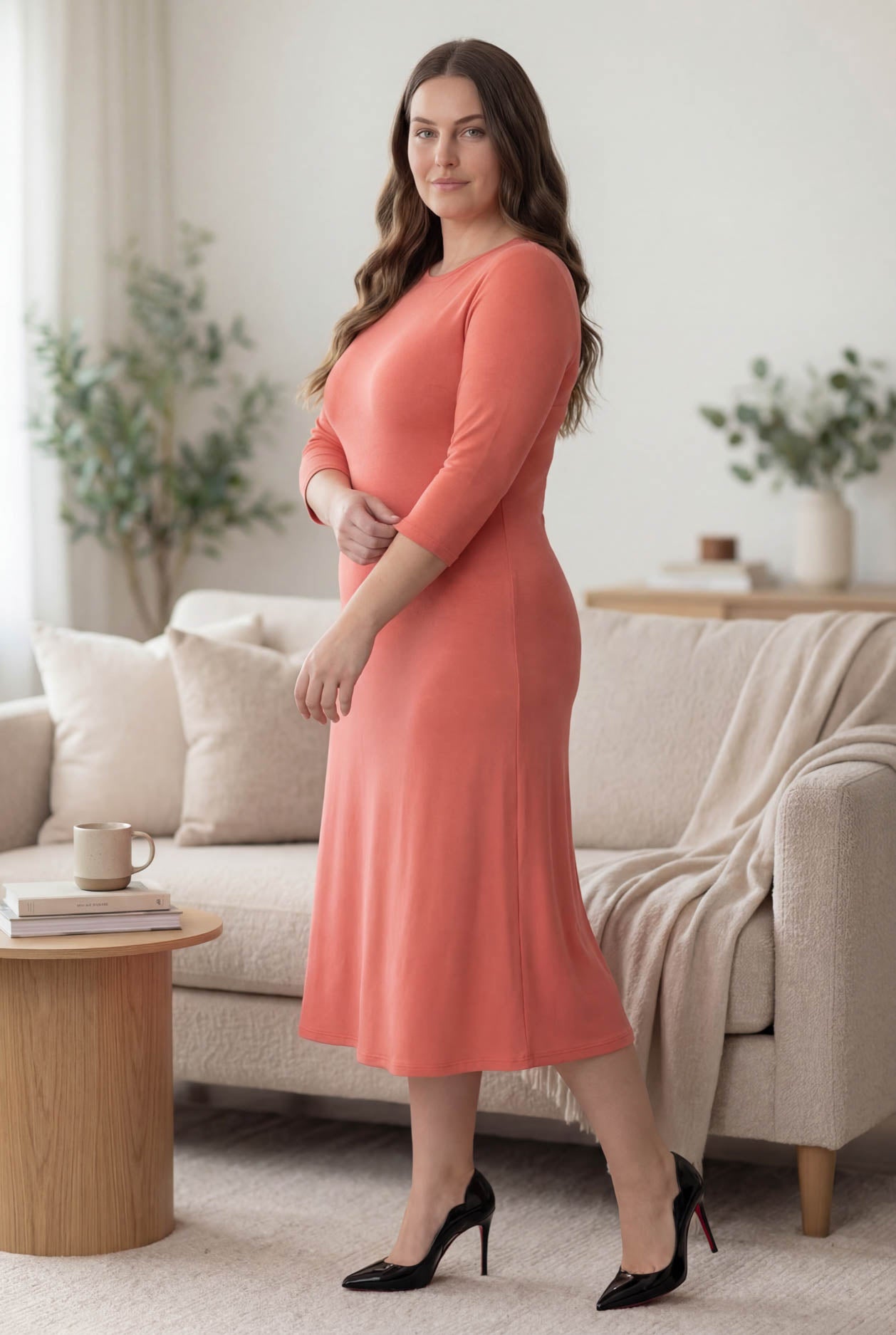 Model wearing Nuggles® Midi Layering Dress in Salmon