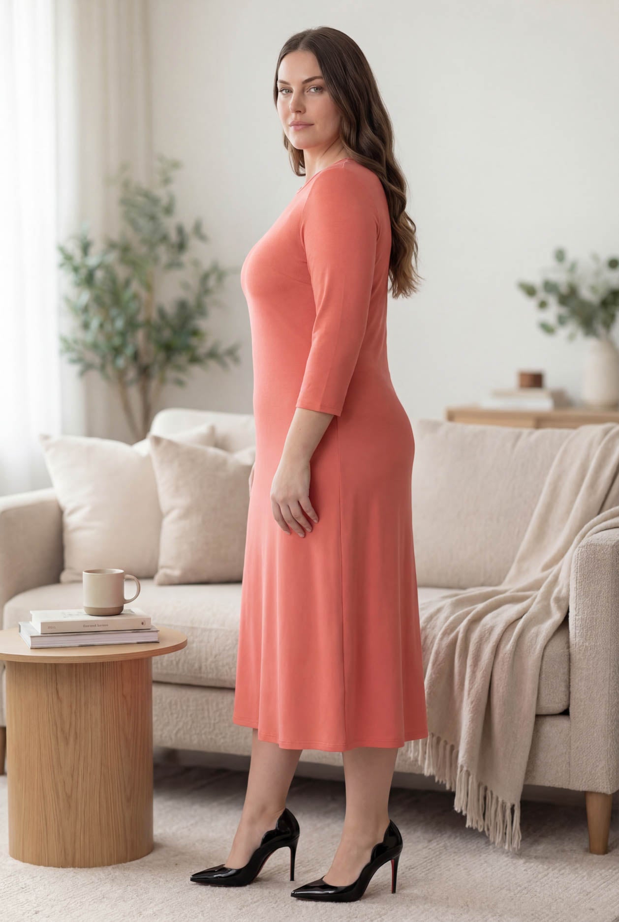Model wearing Nuggles® Midi Layering Dress in Salmon