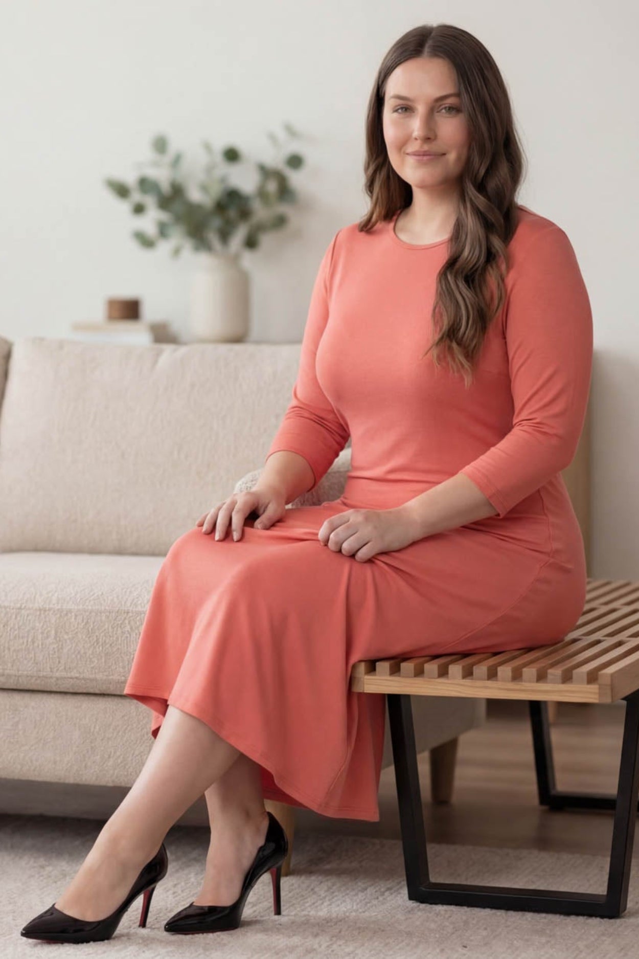 Model wearing Nuggles® Midi Layering Dress in Salmon