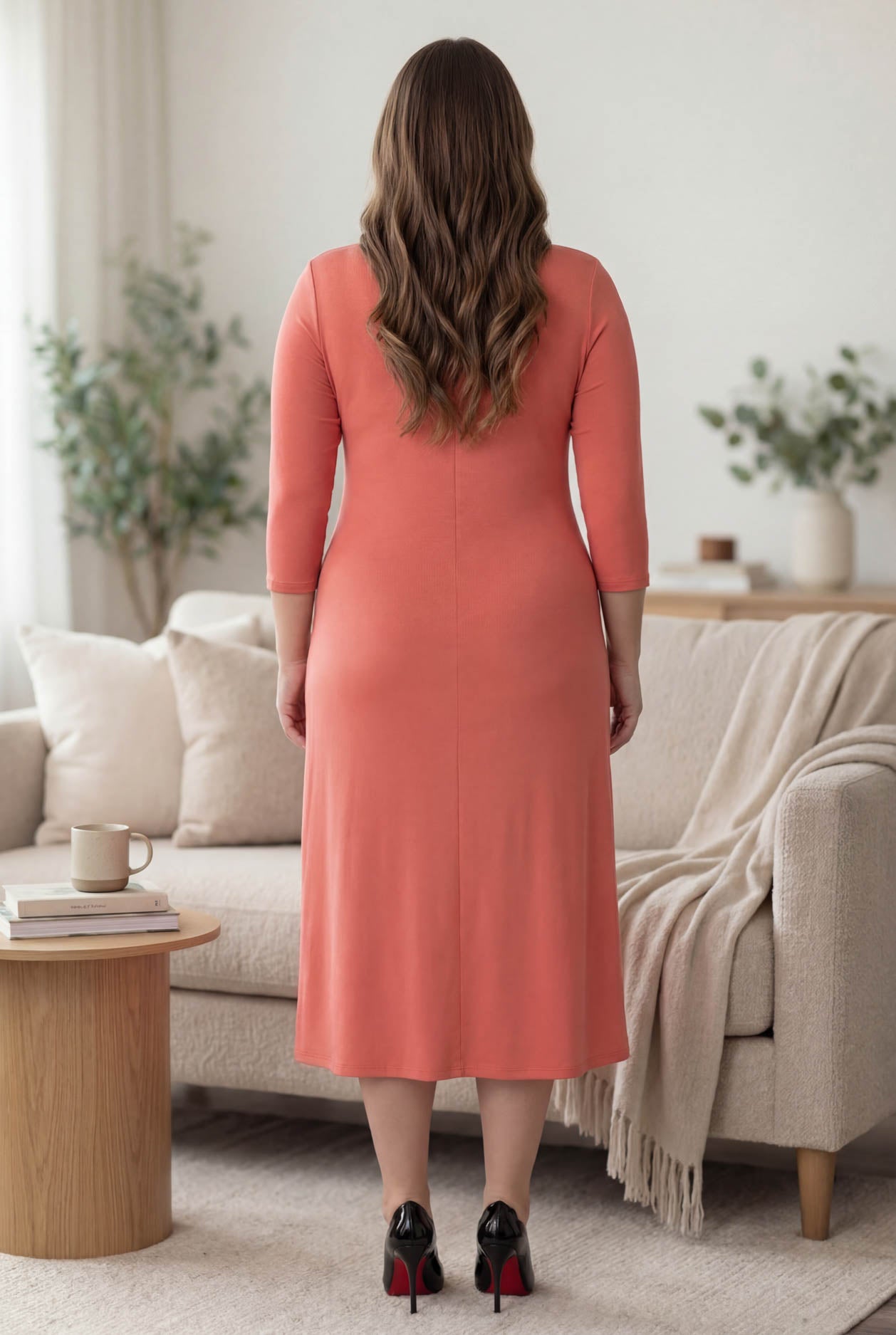 Model wearing Nuggles® Midi Layering Dress in Salmon