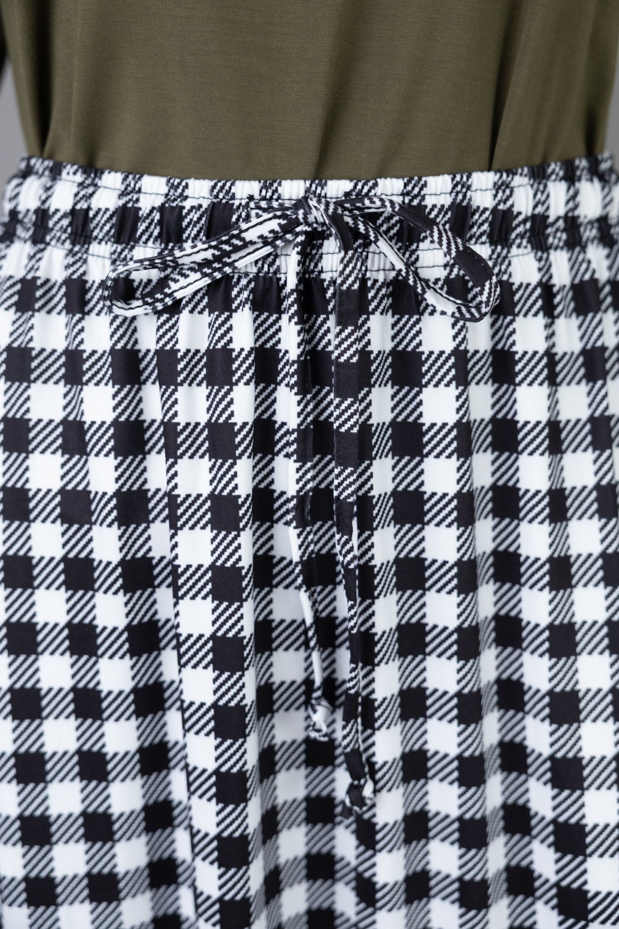 Model wearing Nuggles®  Sage Skirt in Sweet Gingham