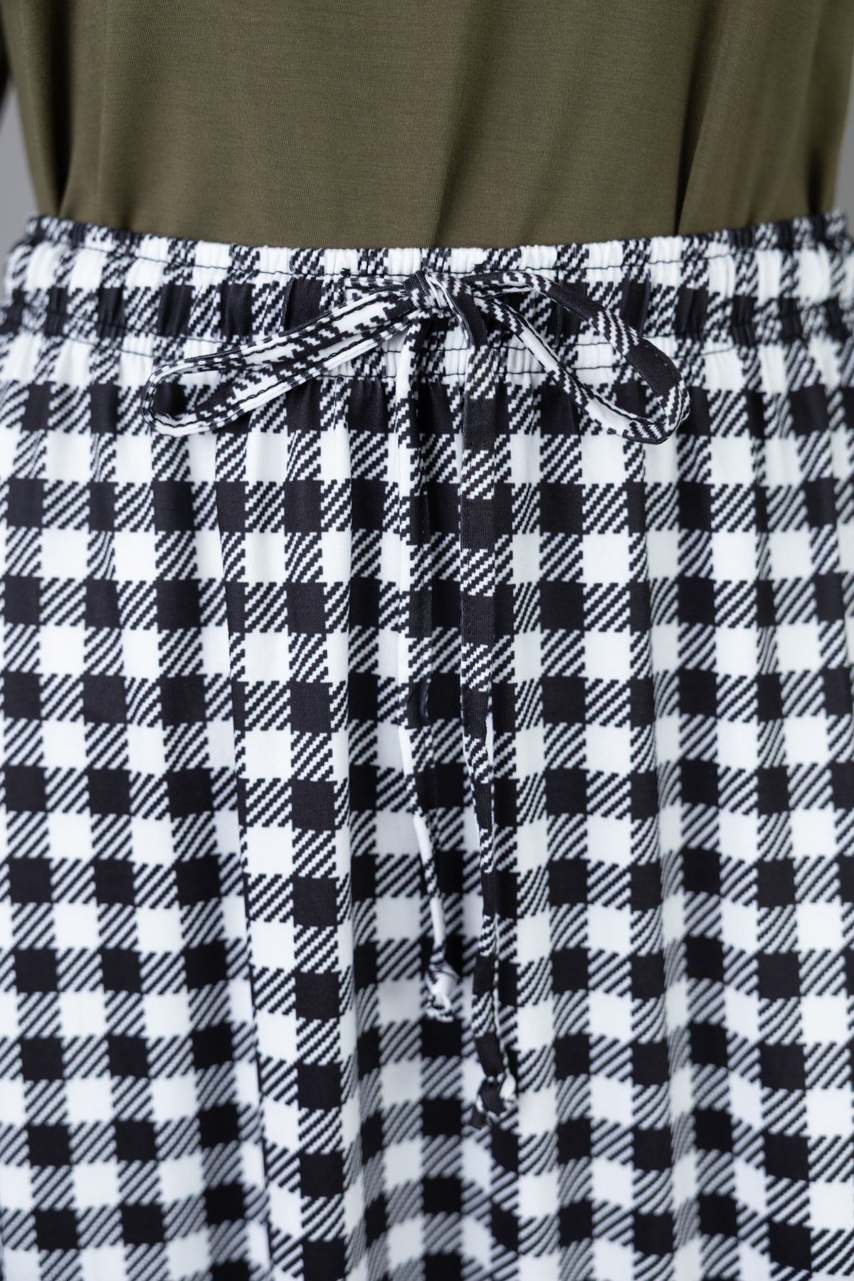 Model wearing Nuggles®  Sage Skirt in Sweet Gingham
