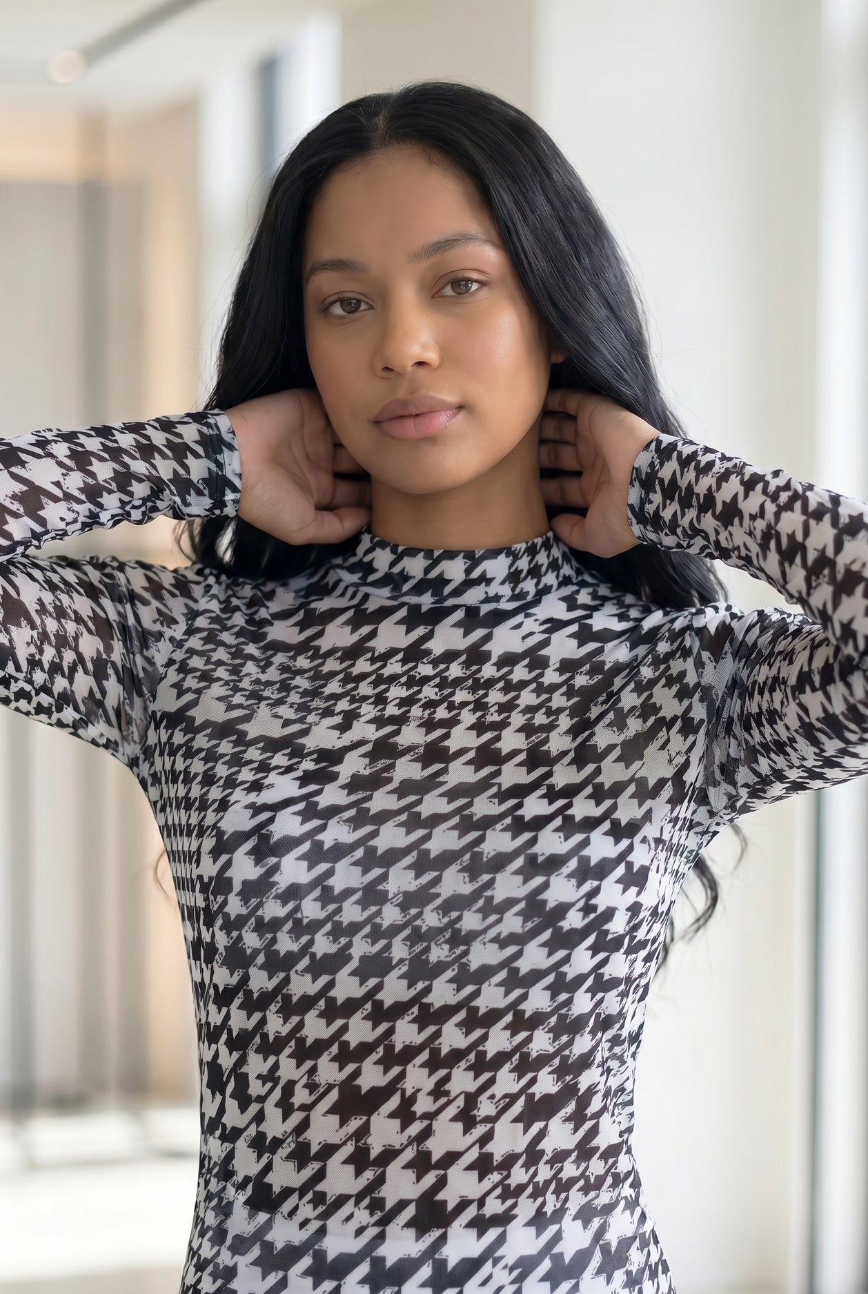 Model wearing Nuggles®  Mesh Tee in Sharp Classic