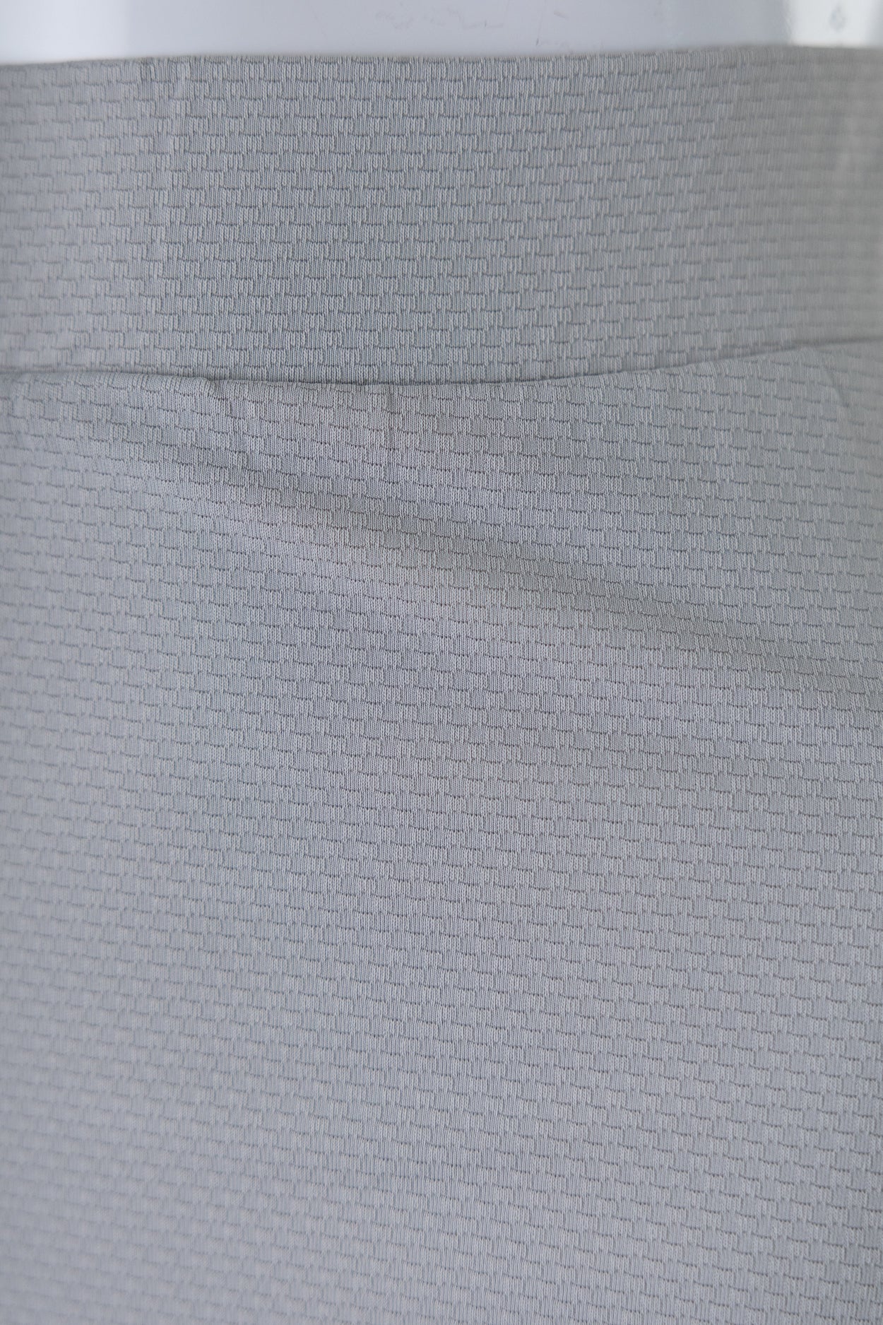 Close Up Detail Shot of Silver Sport Fabric