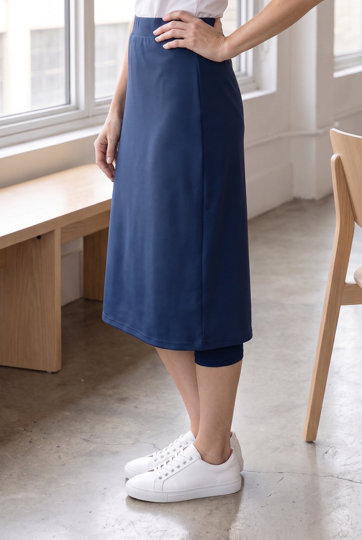 Model wearing Nuggles®  27" Sport Skirt in Slate Blue
