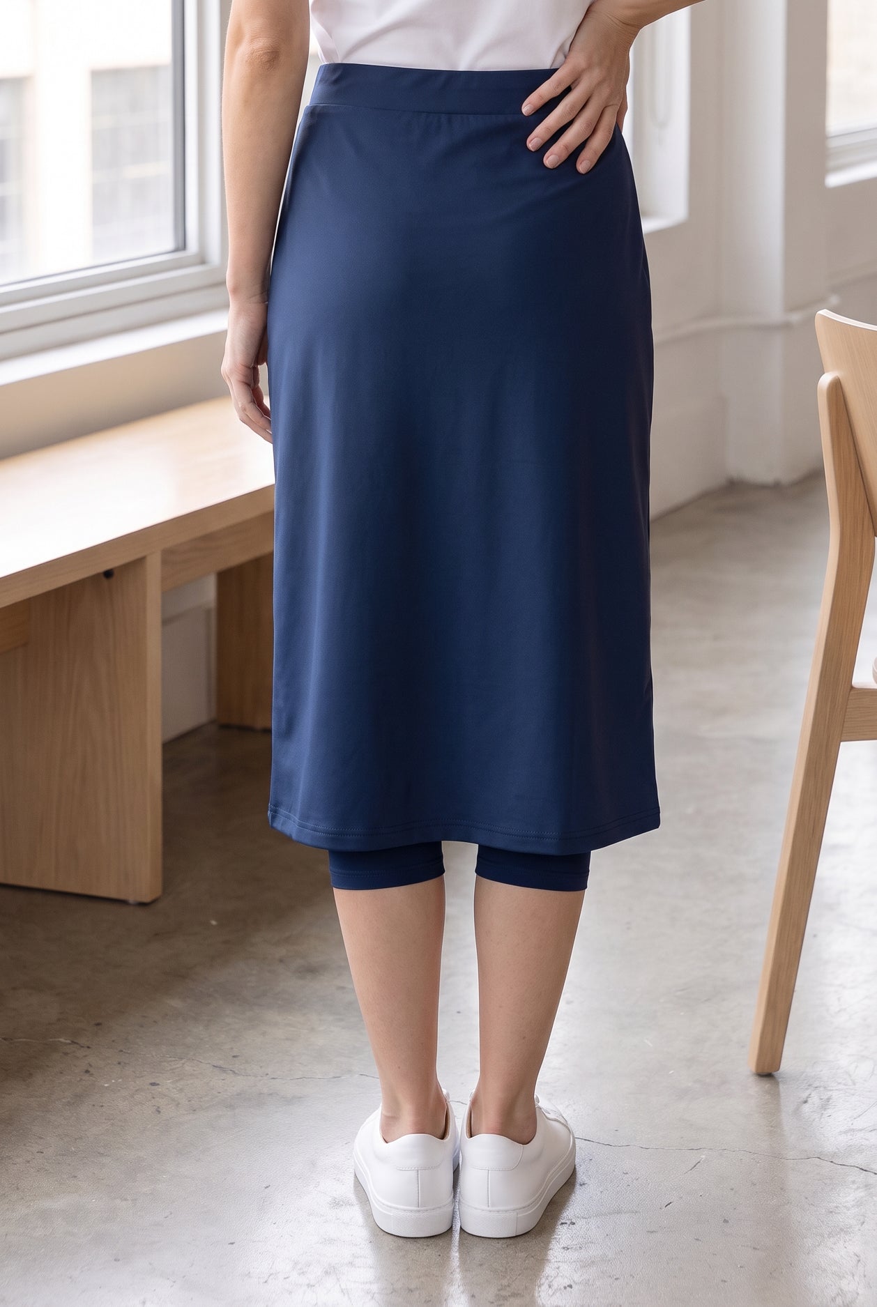 Model wearing Nuggles®  27" Sport Skirt in Slate Blue