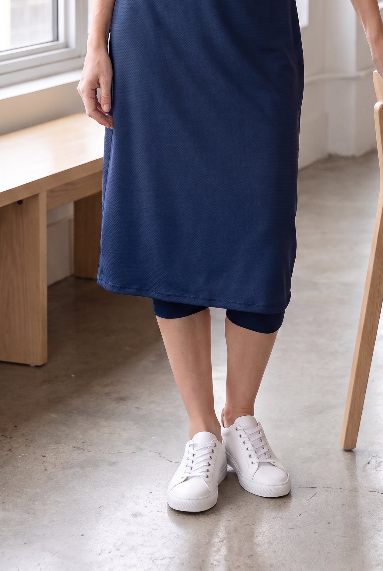 Model wearing Nuggles®  27" Sport Skirt in Slate Blue