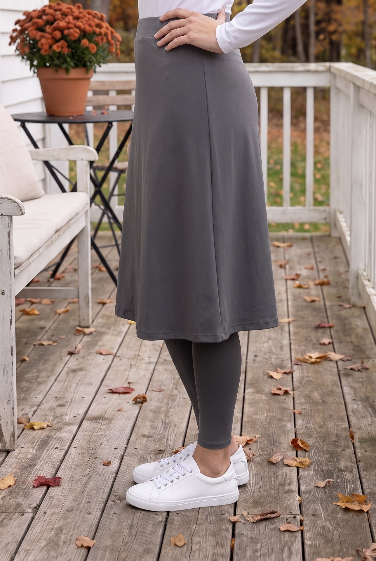 Model wearing Nuggles® Tilly Sport Skirt in Slate Grey