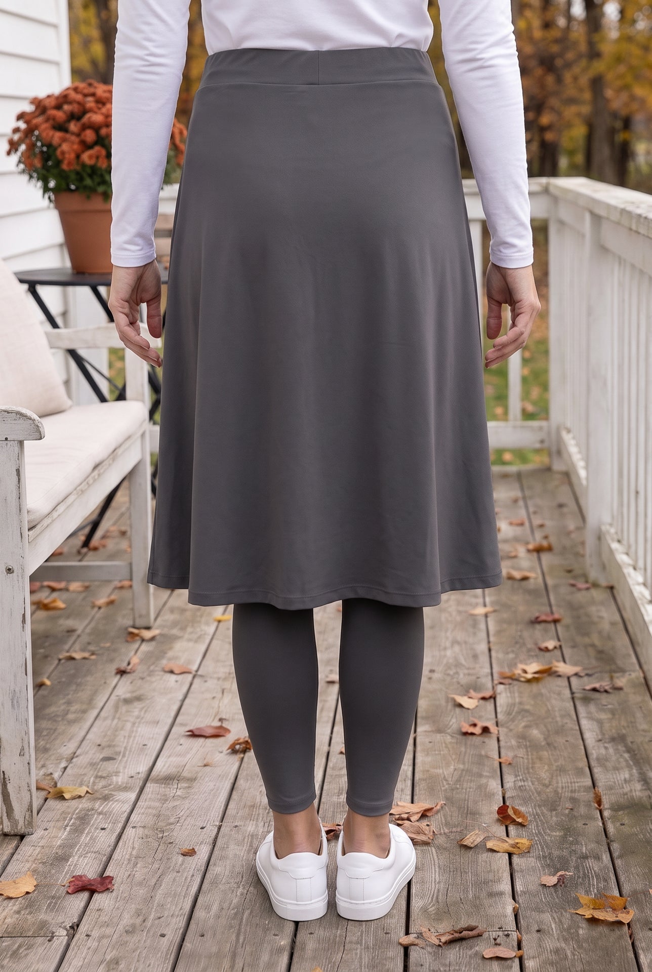Model wearing Nuggles® Tilly Sport Skirt in Slate Grey