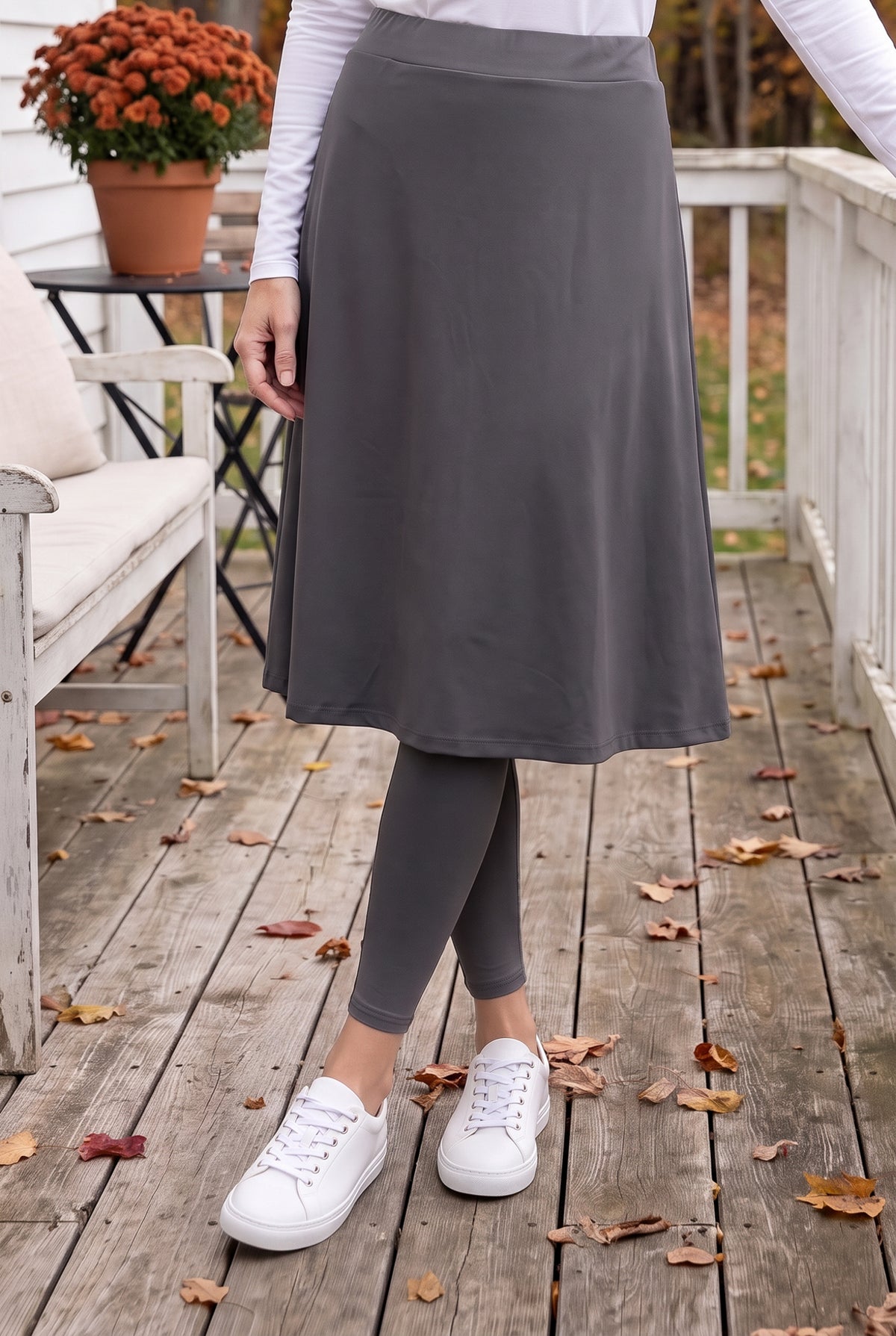 Model wearing Nuggles® Tilly Sport Skirt in Slate Grey