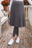 Model wearing Nuggles® Tilly Sport Skirt in Slate Grey