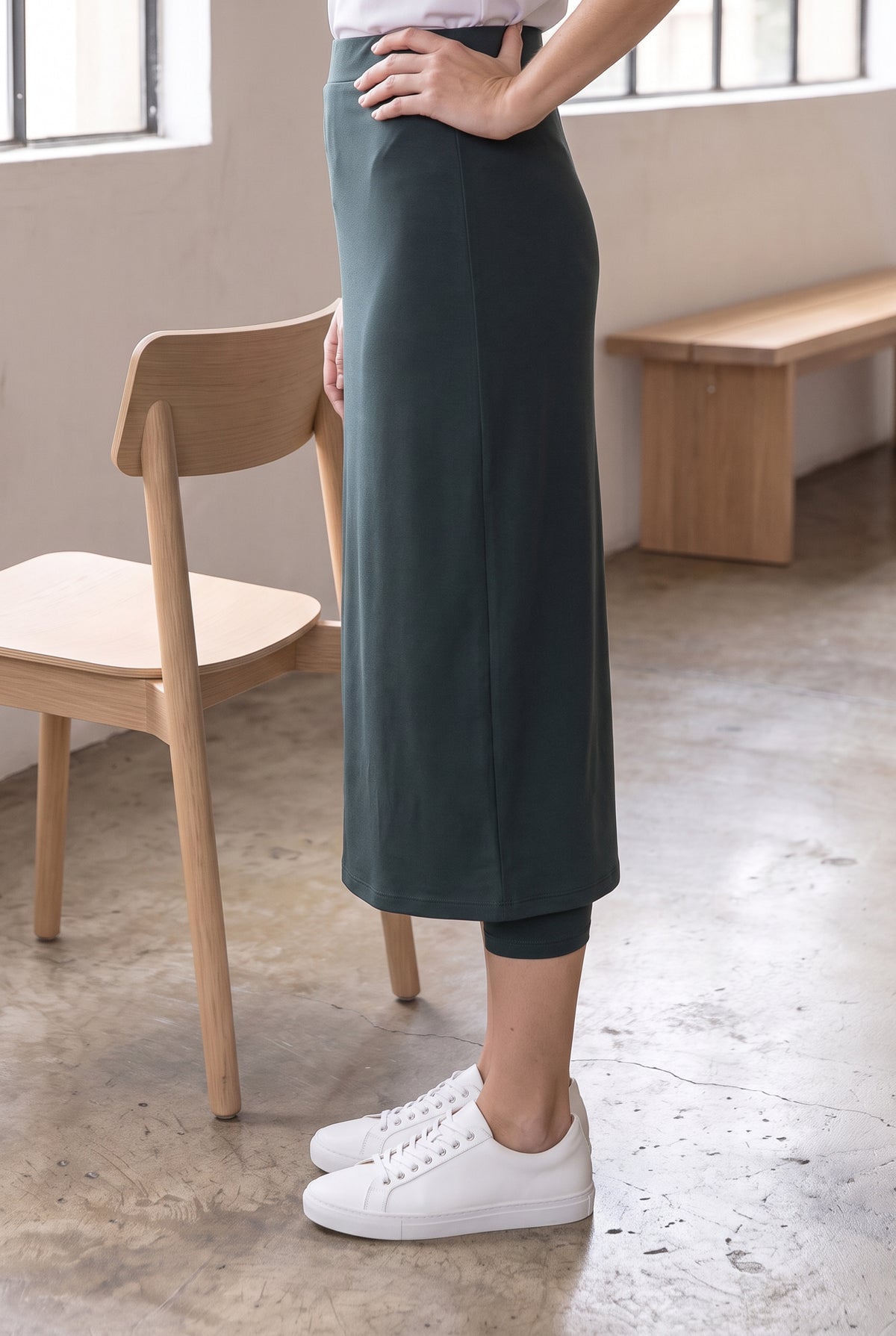 Model wearing Nuggles®  31" Sport Skirt in Smokey Green
