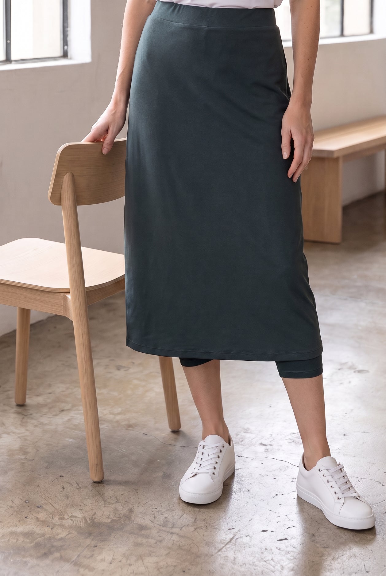 Model wearing Nuggles®  31" Sport Skirt in Smokey Green