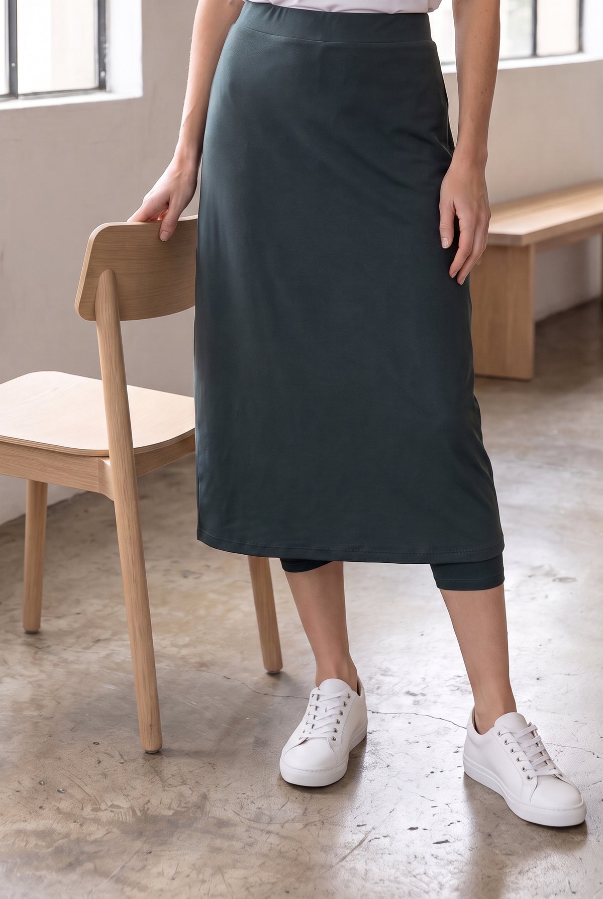 Model wearing Nuggles®  31" Sport Skirt in Smokey Green