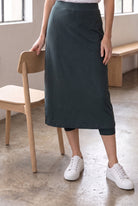 Model wearing Nuggles®  31" Sport Skirt in Smokey Green