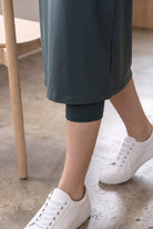 Model wearing Nuggles®  31" Sport Skirt in Smokey Green