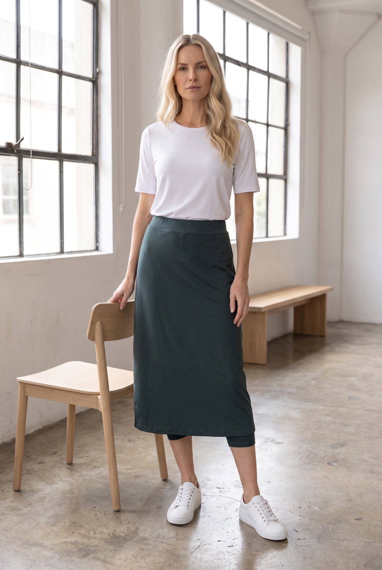 Model wearing Nuggles®  31" Sport Skirt in Smokey Green