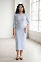 Model wearing Nuggles® Ribbed Midi Layering Dress in Soft Blue