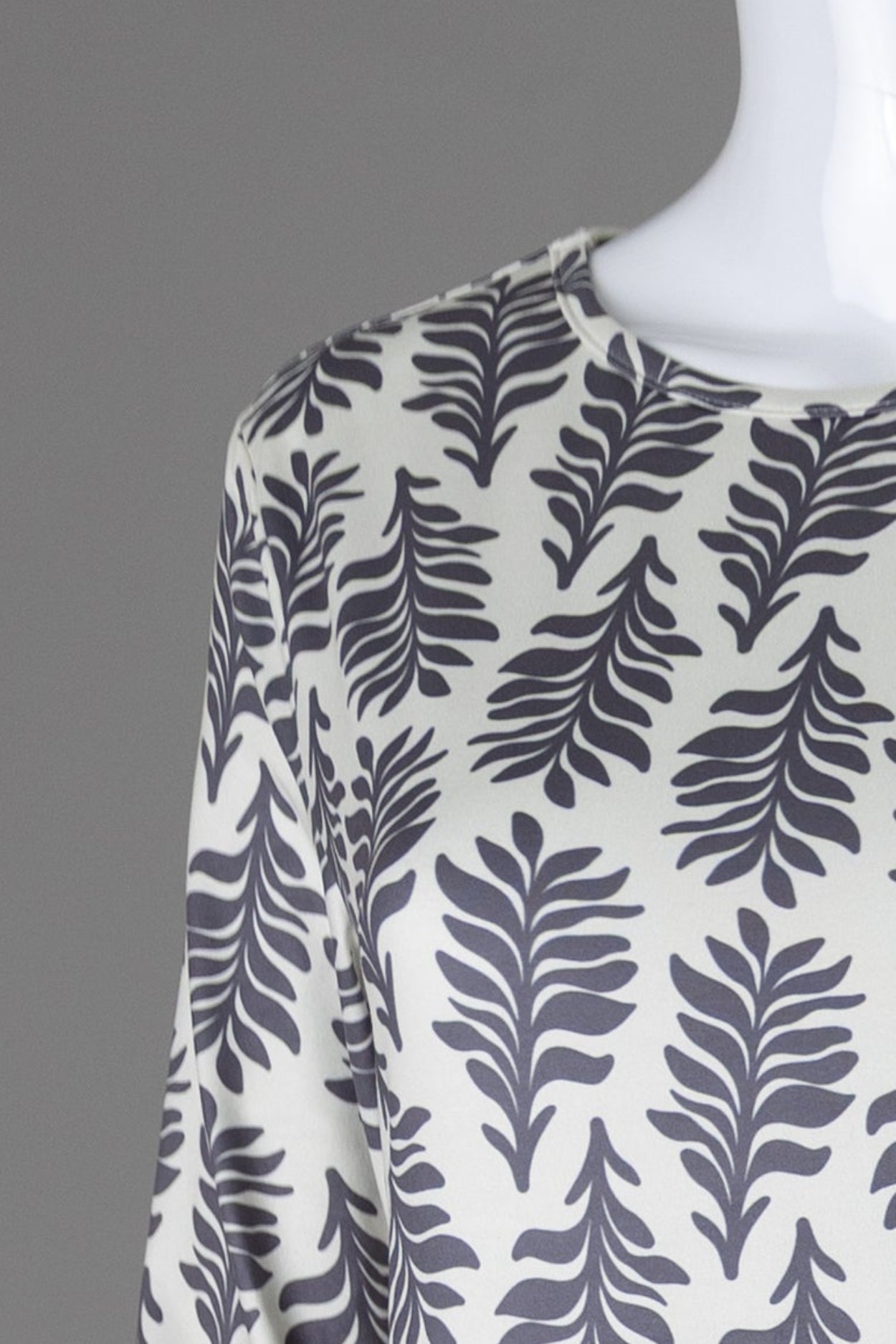 Model wearing Nuggles® Midi Layering Dress in Soft Fern