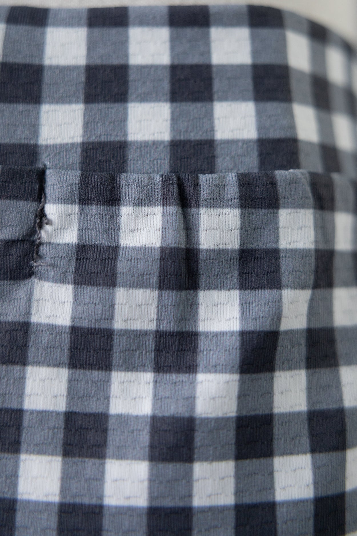 Close-up of a blue and white checkered fabric.