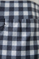 Close-up of a blue and white checkered fabric.