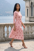 Nuggles Nova Midi Dress in Sugar Bow, soft pink bow-print modest cotton dress with 3/4 sleeves