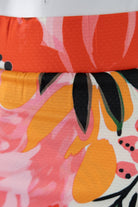 Model wearing Nuggles® 27" All-Sport Skirt in Summer Tropic